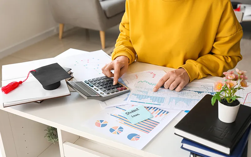 Financial literacy volunteer calculating numbers